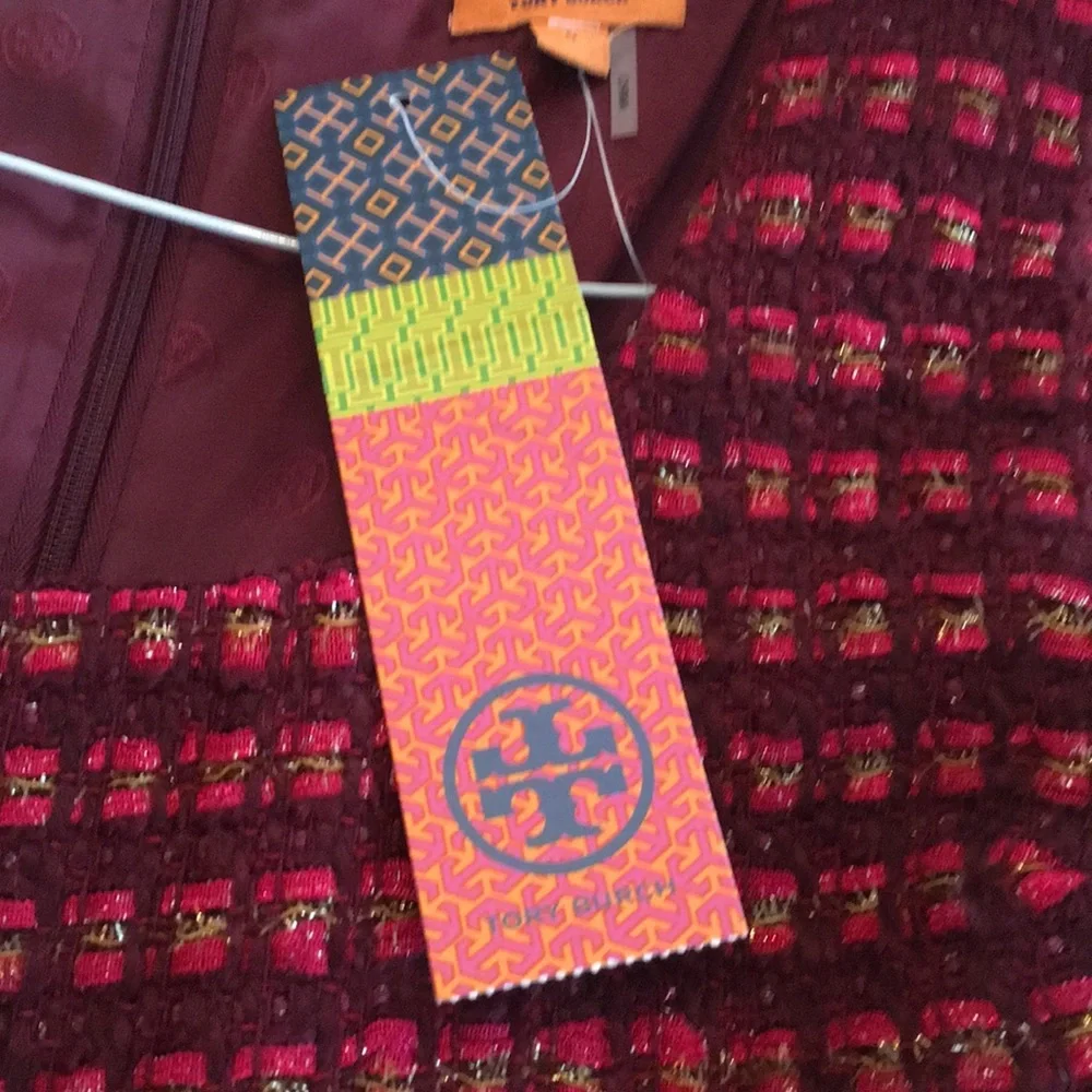 Tory Burch victory dress.NWT. In dark‎ plum